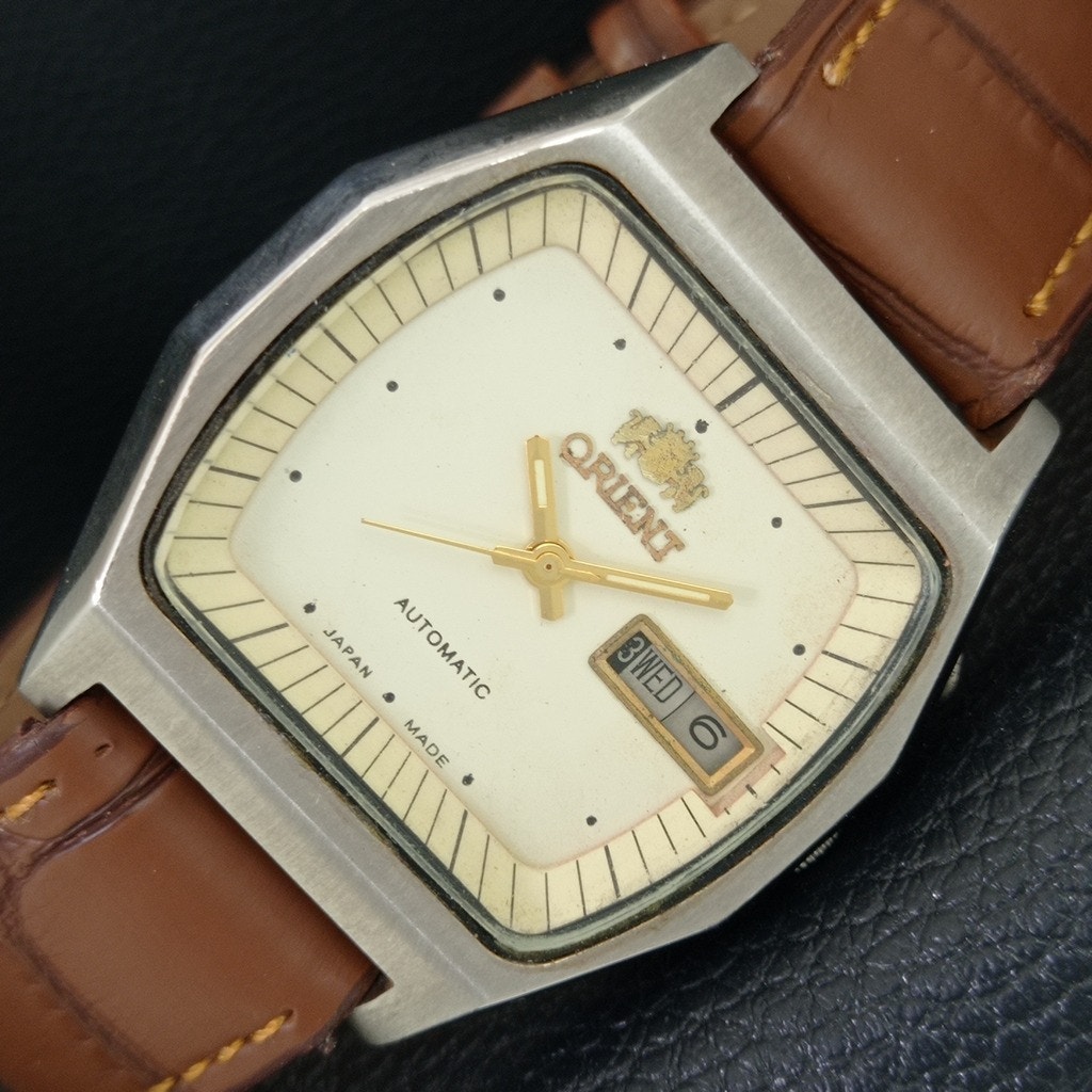 Vintage 1978 Orient Automatic Mens Silver Watch WDaydate  Gold Accents